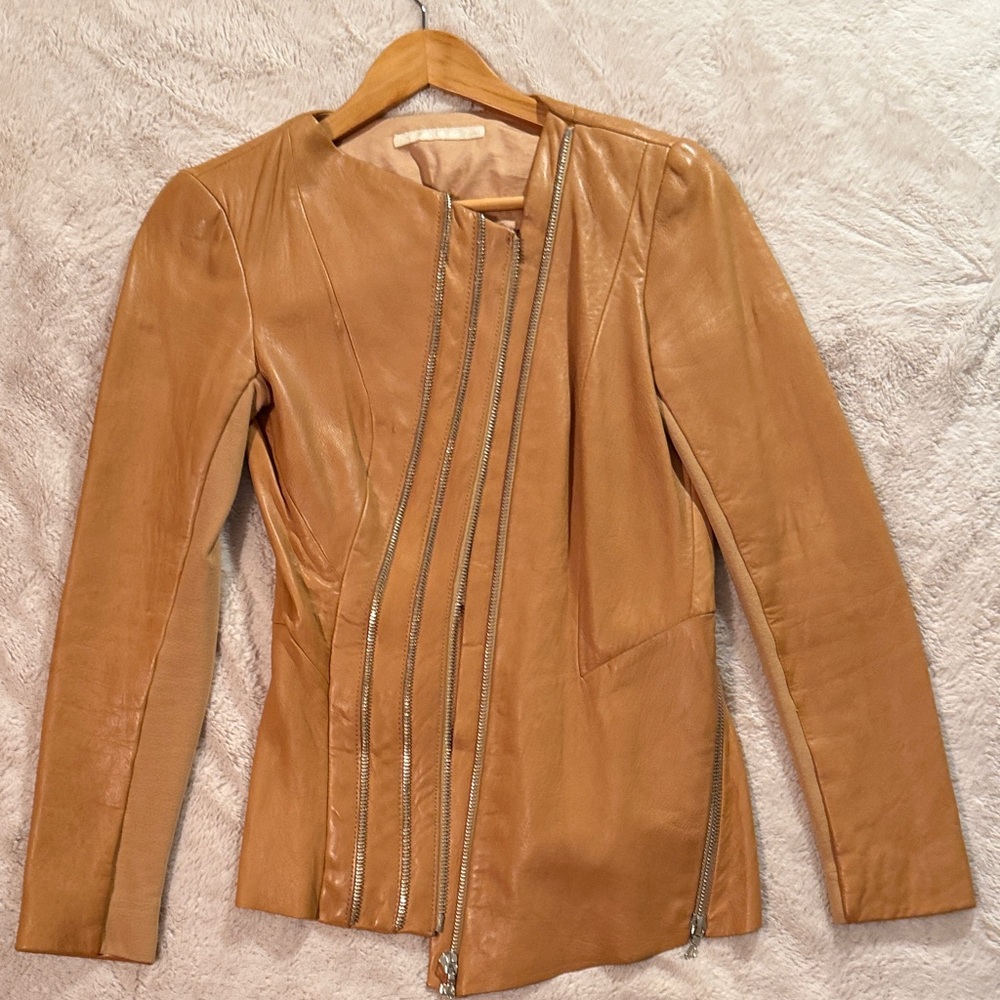 Peplum Style Leather Jacket with Asymmetrical zipper